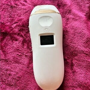 White Handheld IPL Hair Removal Device